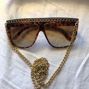 Sunglasses with gold chain